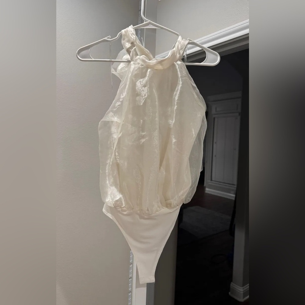 White Bodysuit, Halter Neckline with Bow
Size S Krush Boutique